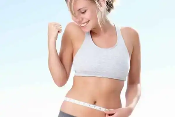 Unraveling the Mystery: Where Does the Body Fat Loss From First? 3 Image of woman happy with fat loss Maidstone